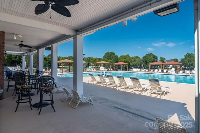 a outdoor space with lots of tables and chairs