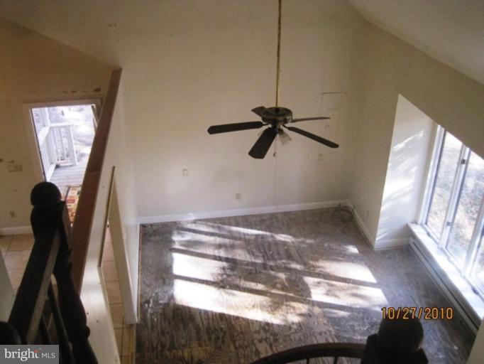 355 Rt 28 Berkeley Springs Berkeley Springs, WV 25411 - Photo 18 of 24 a view of a livingroom with a staircase