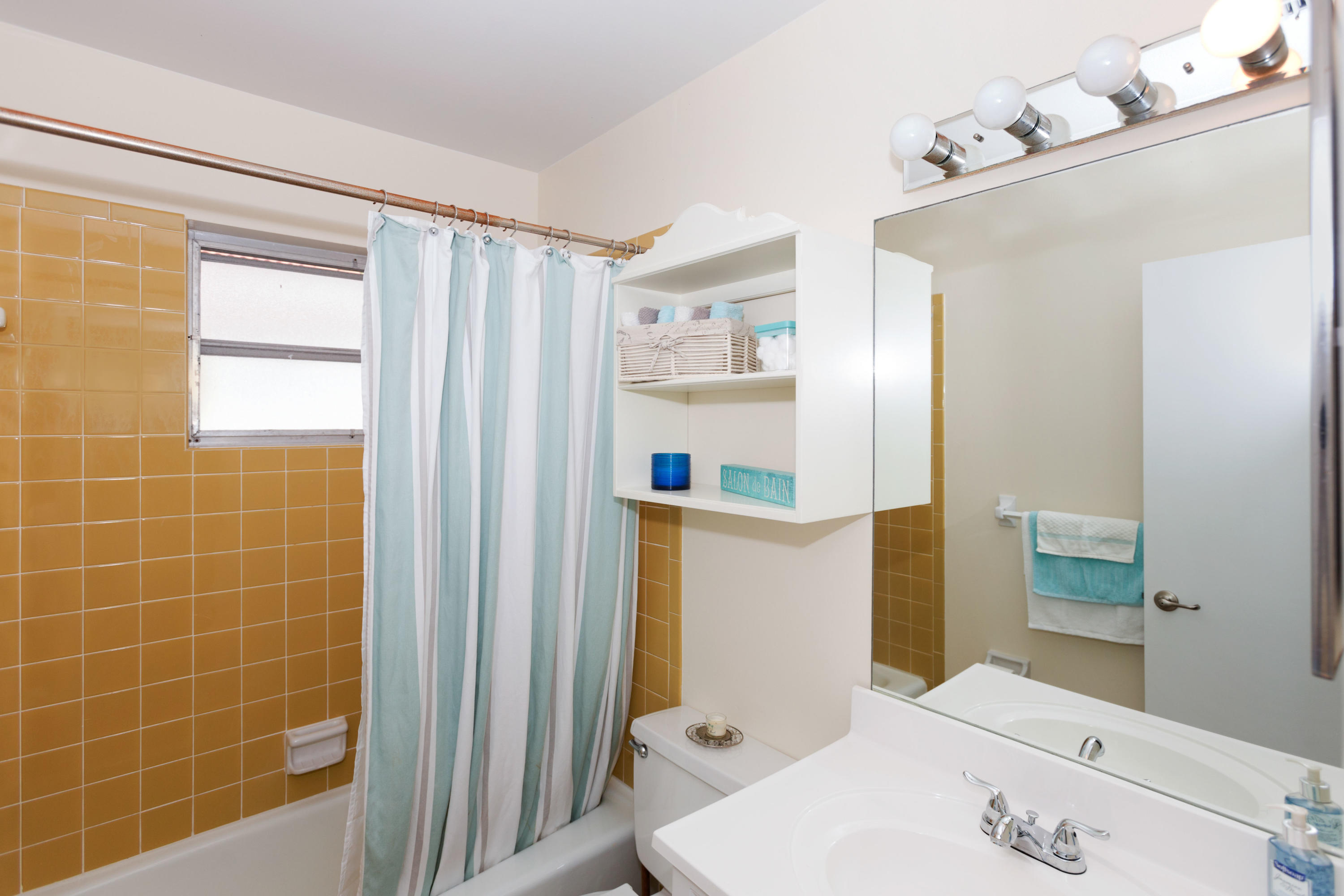 12705 Ellison Wilson Road North Palm Beach, FL 33408 - Photo 11 of 19 a bathroom with a sink and a shower