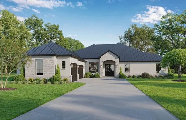 a front view of a house with a garden and trees