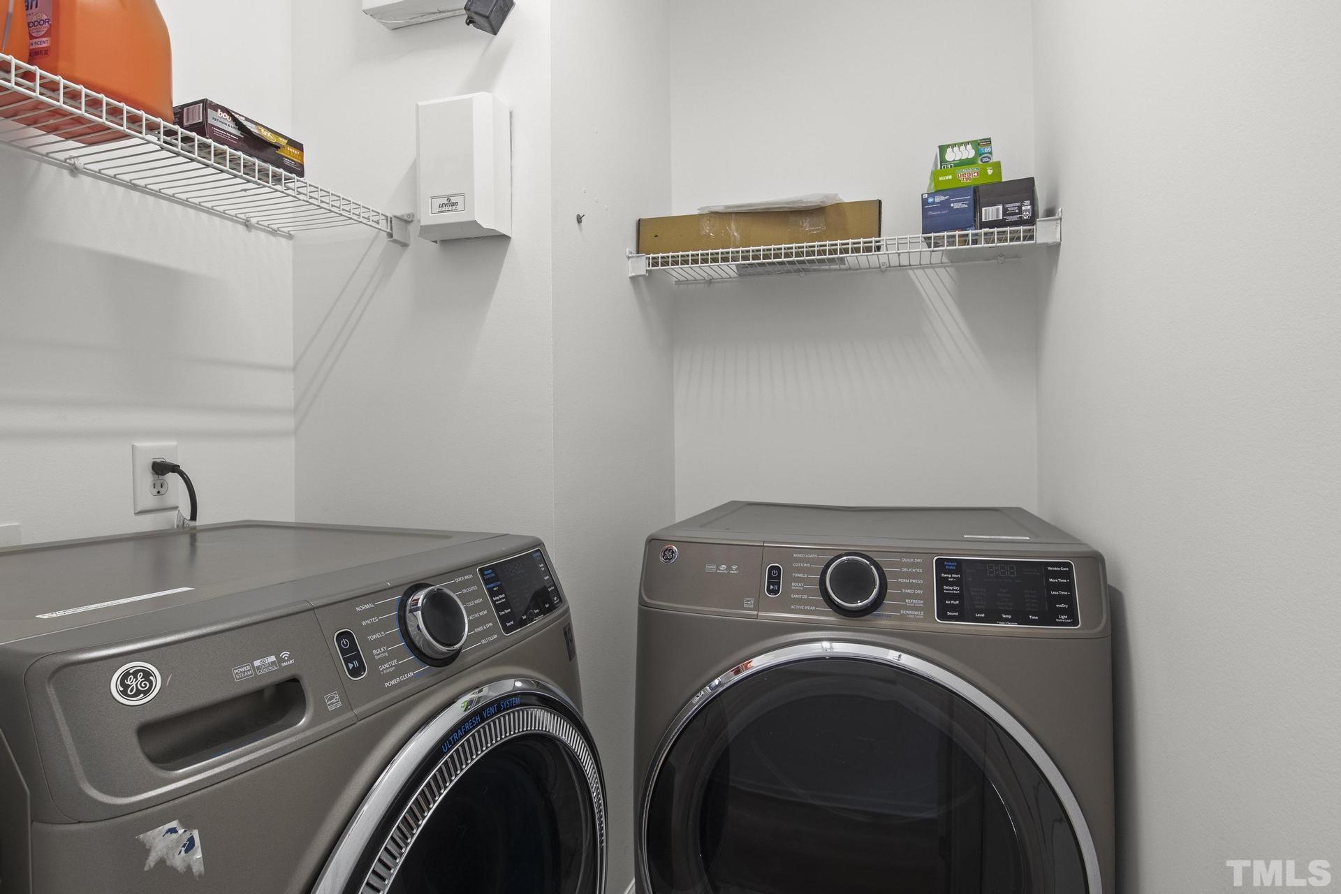1727 Crag Burn Lane Raleigh, NC 27604 - Photo 27 of 43 a utility room with dryer and washer