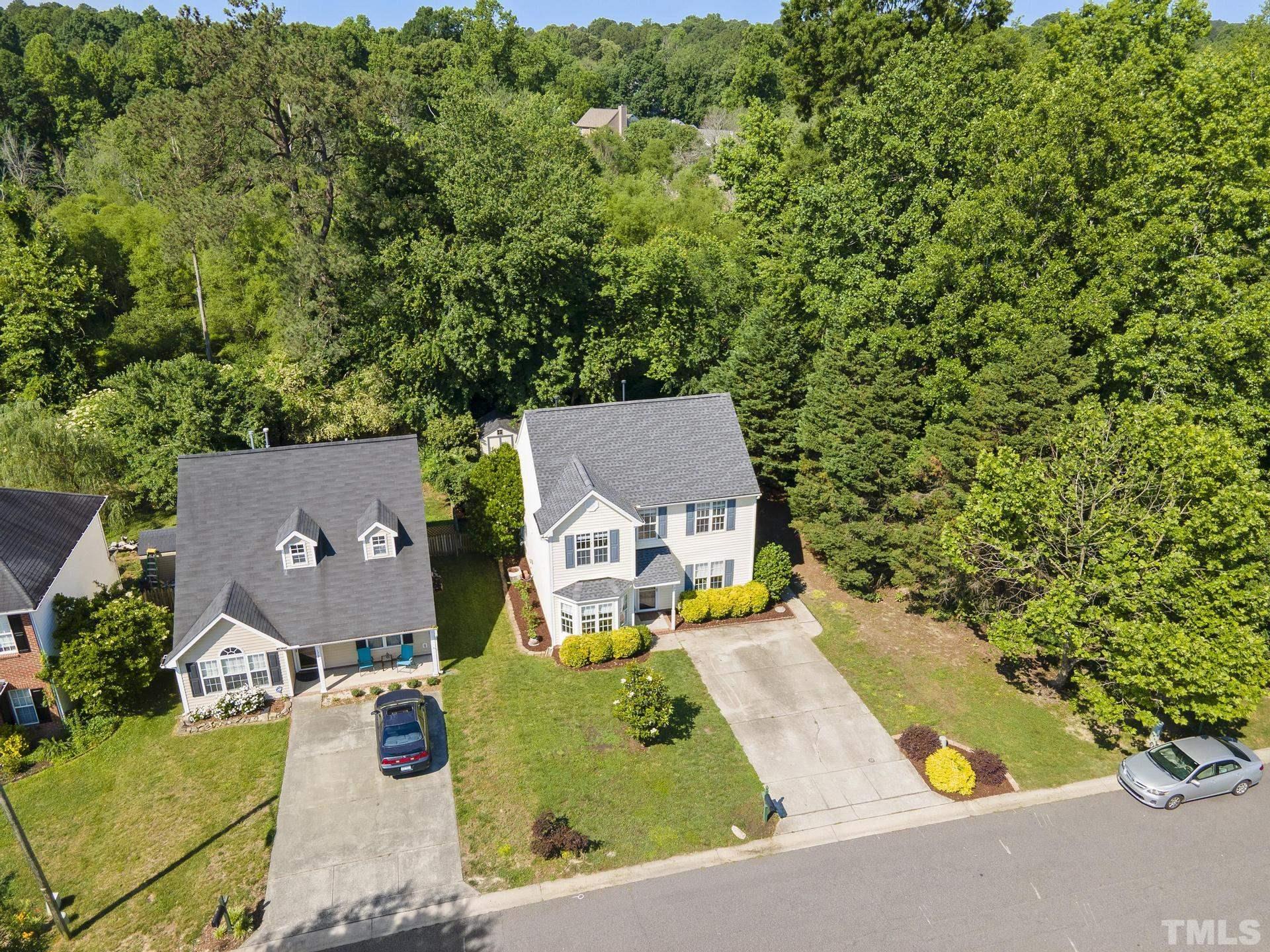 1727 Crag Burn Lane Raleigh, NC 27604 - Photo 39 of 43 an aerial view of residential house with yard and outdoor seating