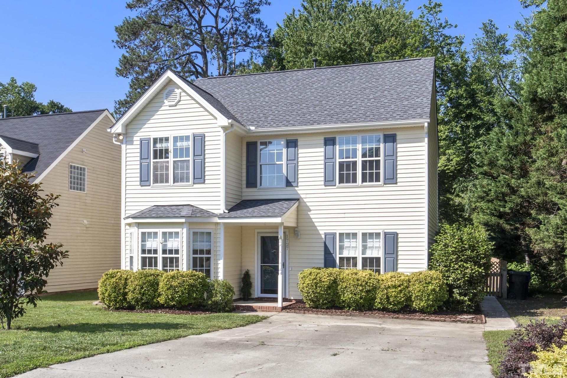1727 Crag Burn Lane Raleigh, NC 27604 - Photo 42 of 43 a front view of a house with a yard