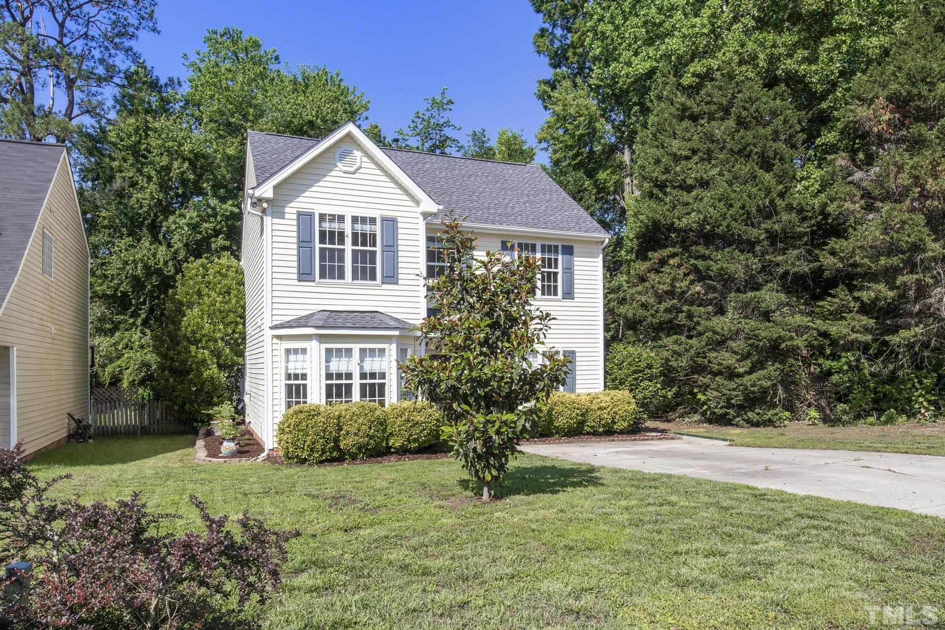 1727 Crag Burn Lane Raleigh, NC 27604 - Photo 43 of 43 a front view of a house with garden