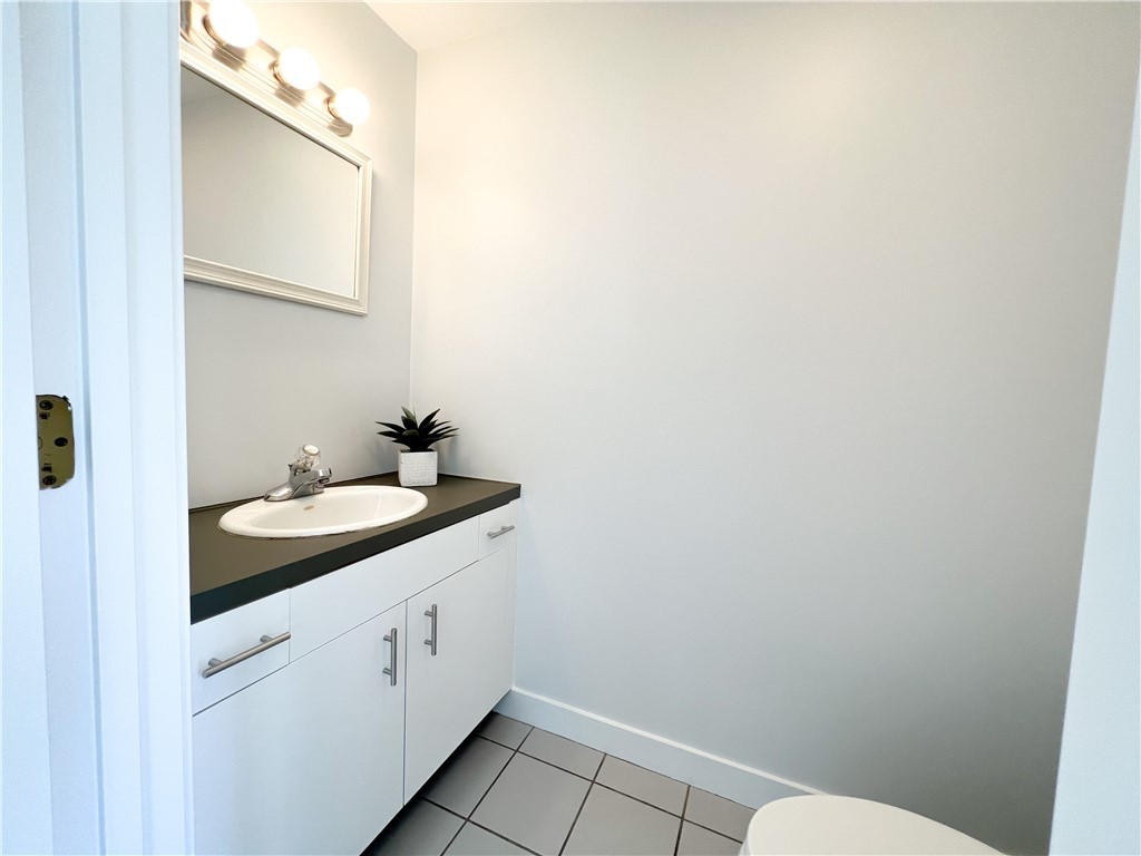9 Poppasquash Road Bristol, RI 02809 - Photo 22 of 36 Convenient first floor half bath