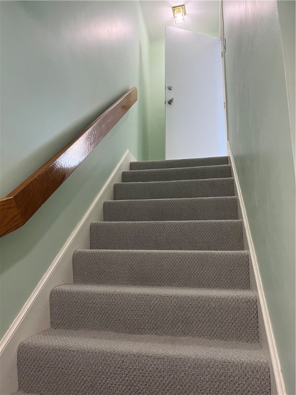 9 Poppasquash Road Bristol, RI 02809 - Photo 24 of 36 Finished stairwell to garage