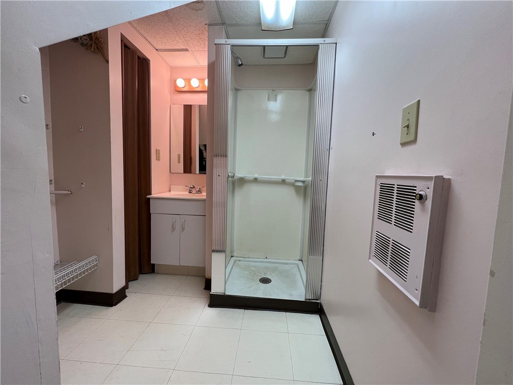 9 Poppasquash Road Bristol, RI 02809 - Photo 25 of 36 Shower and sink in lower entry