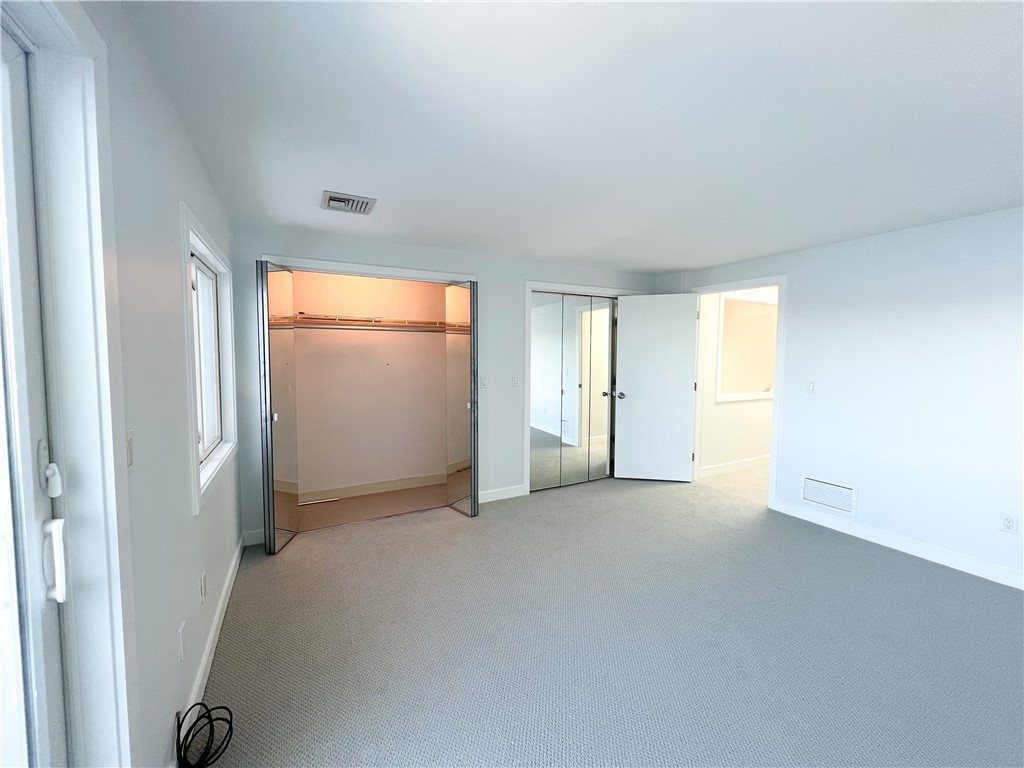 9 Poppasquash Road Bristol, RI 02809 - Photo 10 of 36 Spacious double closets in the primary bedroom