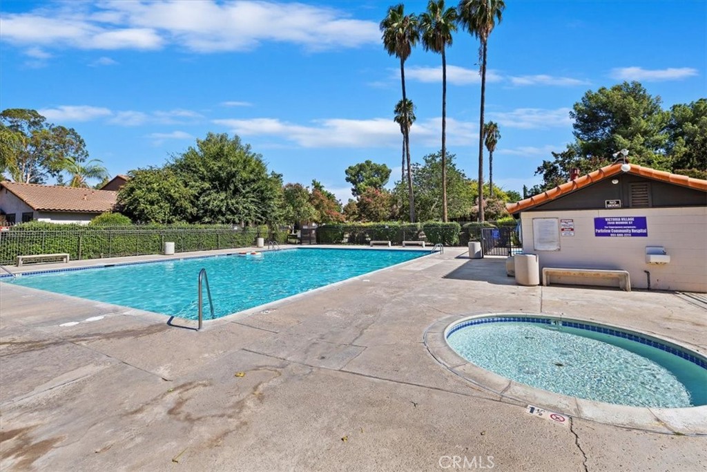 2850 Monroe Street Riverside, CA 92504 - Photo 17 of 23 a view of a swimming pool with a yard