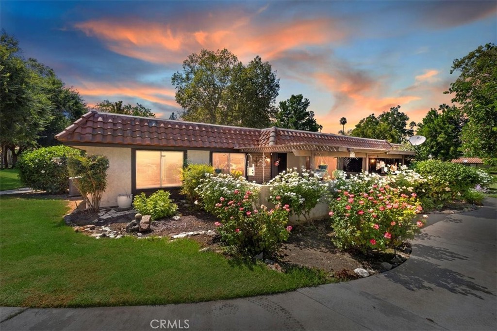 2850 Monroe Street Riverside, CA 92504 - Photo 2 of 23 a front view of a house with garden