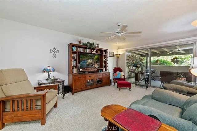 view of a house with yard and a garden