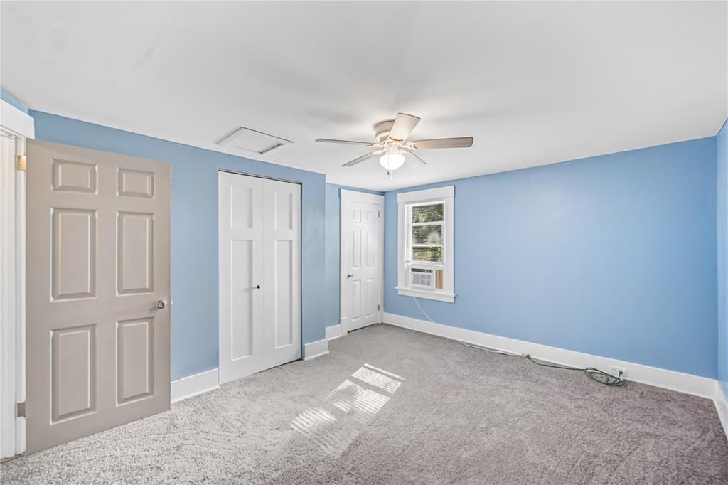 1039 North Keel Ridge Road Hermitage, PA 16148 - Photo 22 of 47 a view of an empty room with a window