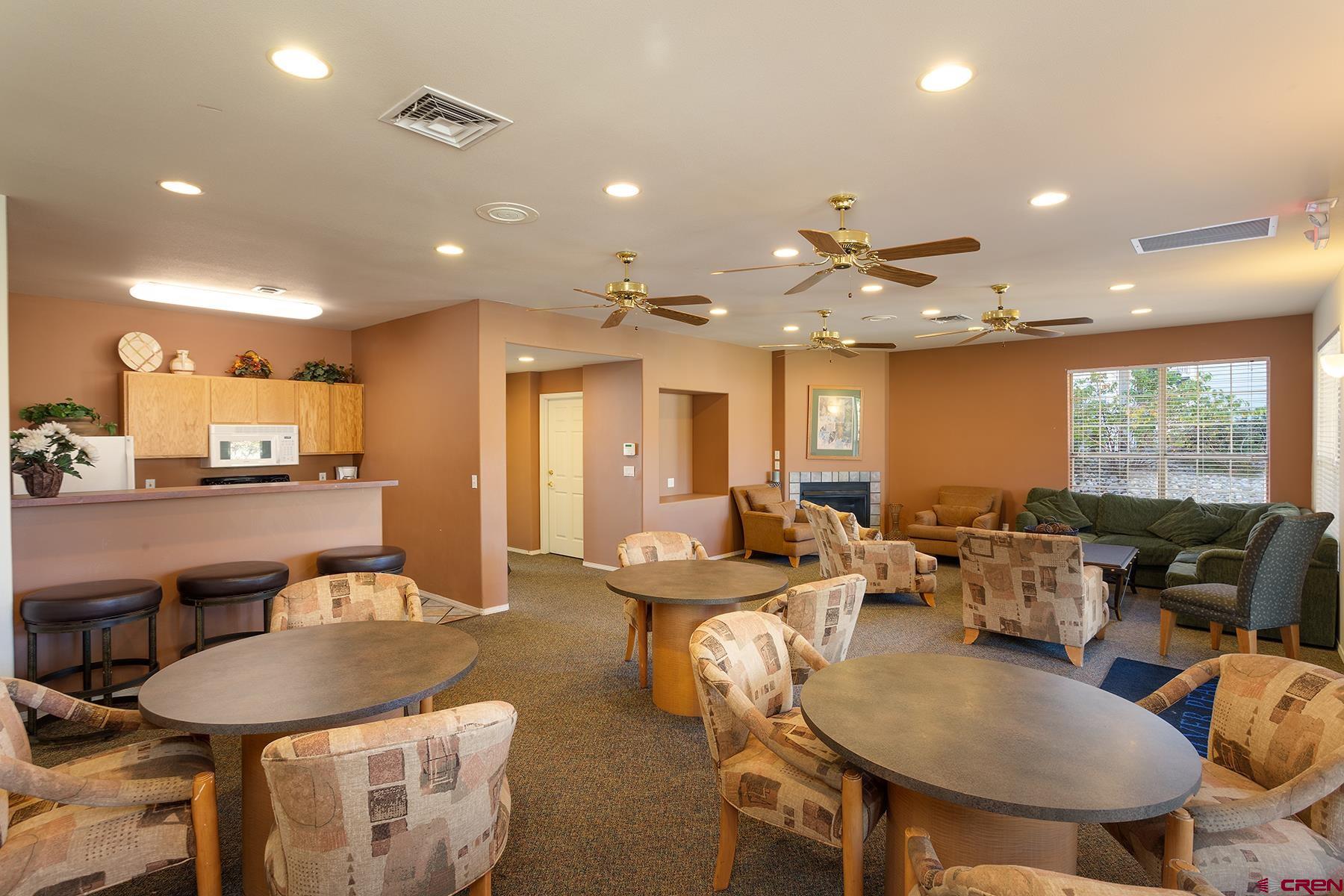 1100 Goeglein Gulch Road, Unit 236 Durango, CO 81301 - Photo 17 of 23 a large kitchen with a table and chairs