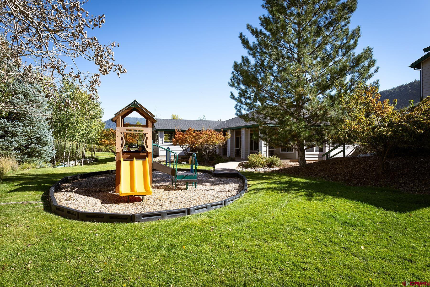 1100 Goeglein Gulch Road, Unit 236 Durango, CO 81301 - Photo 23 of 23 a view of a house with garden and sitting area