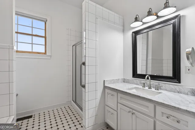 a kitchen with stainless steel appliances granite countertop a granite counter tops and a stove