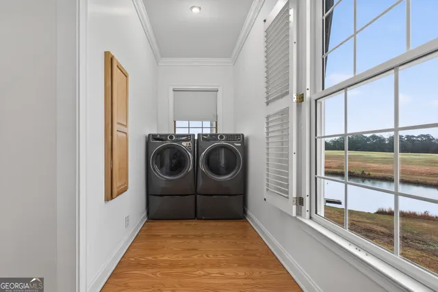 a view of a kitchen with a sink and a fireplace