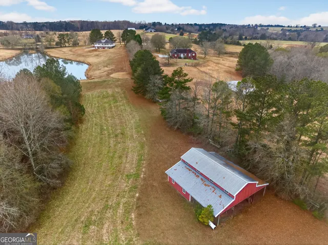 a view of a house with a swimming pool