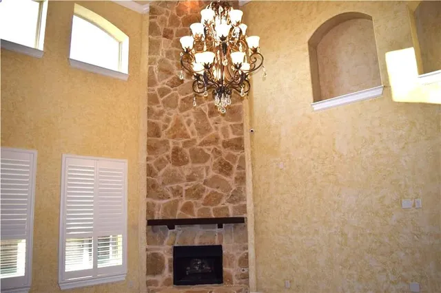 a front view of a house with a fireplace