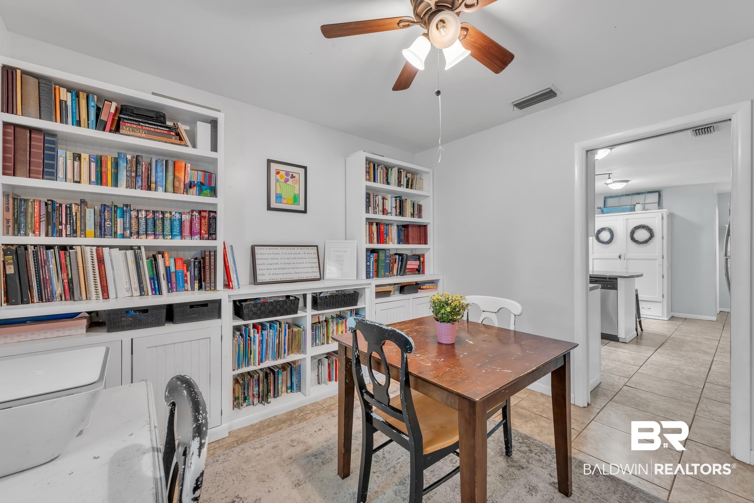 224 Cache Circle Mobile, AL 36611 - Photo 14 of 42 Dining area with ceiling fan and light tile patterned floors