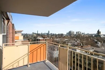 a view of a city from a balcony