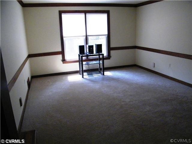 2710 Old Gun Road West Midlothian, VA 23113 - Photo 6 of 12 an empty room with windows