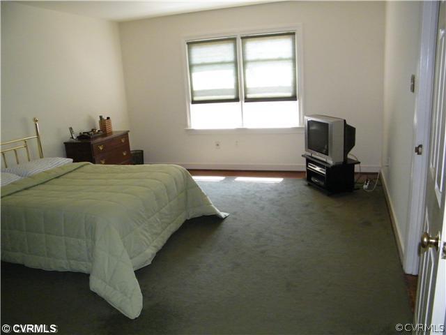 2710 Old Gun Road West Midlothian, VA 23113 - Photo 7 of 12 a bedroom with a bed and a window