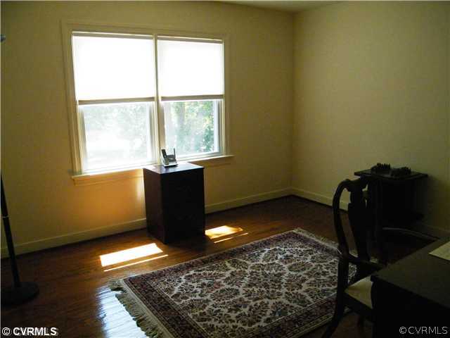 2710 Old Gun Road West Midlothian, VA 23113 - Photo 8 of 12 a room with wooden floor and a window