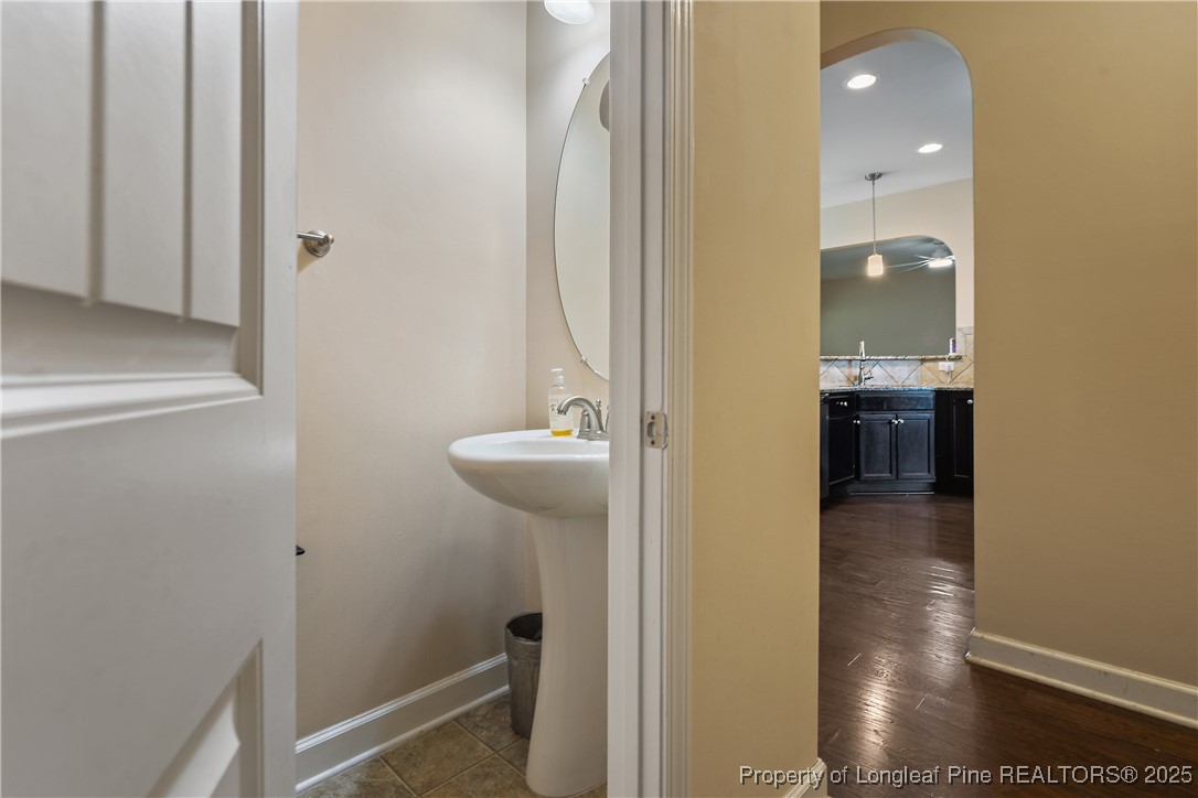 945 Pecan Grove Loop Hope Mills, NC 28348 - Photo 18 of 42 a bathroom with a sink