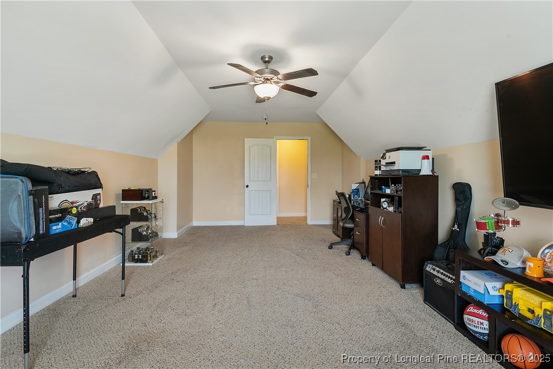 945 Pecan Grove Loop Hope Mills, NC 28348 - Photo 26 of 42 a view of a workspace with furniture and a window