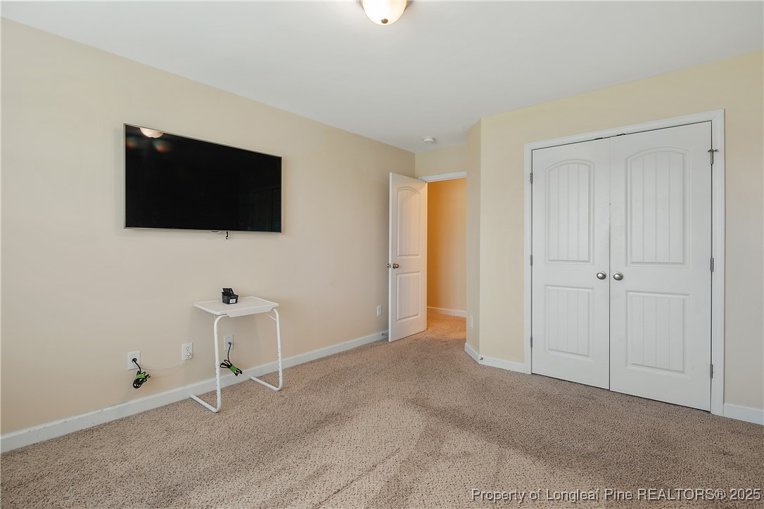 945 Pecan Grove Loop Hope Mills, NC 28348 - Photo 29 of 42 a view of a livingroom with a flat screen tv