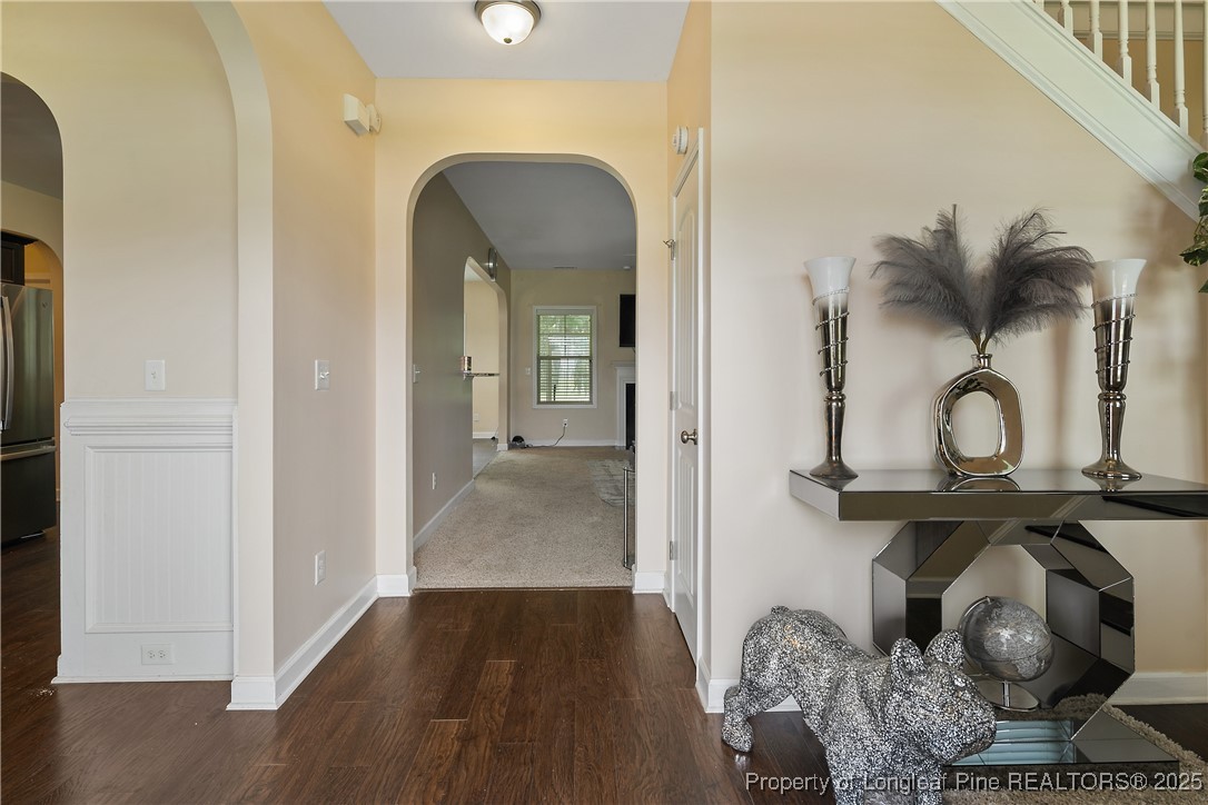 945 Pecan Grove Loop Hope Mills, NC 28348 - Photo 5 of 42 a view of a livingroom with wooden floor
