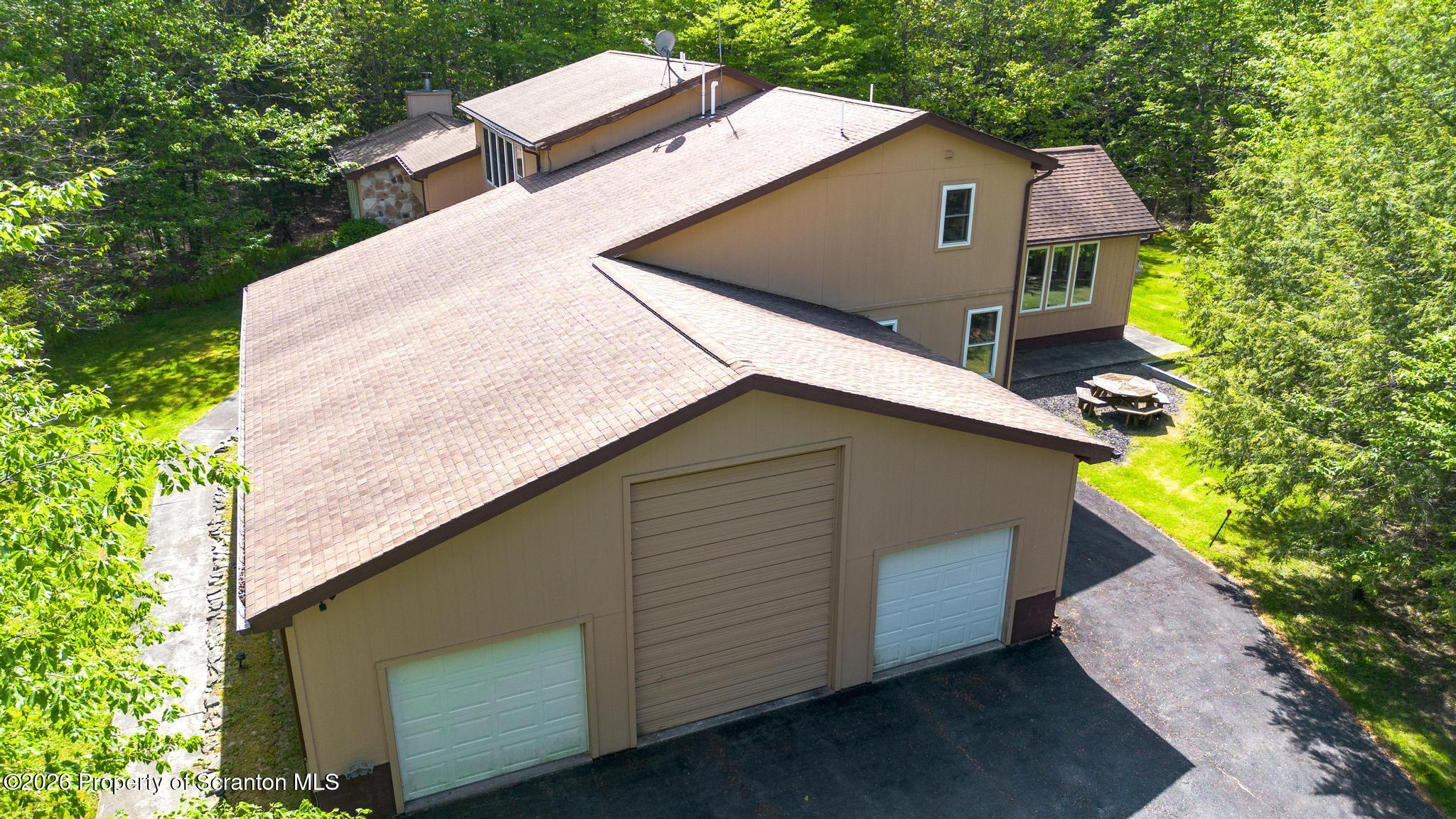 58 Bender Road Gouldsboro, PA 18424 - Photo 4 of 55 a aerial view of a house with a yard and large tree