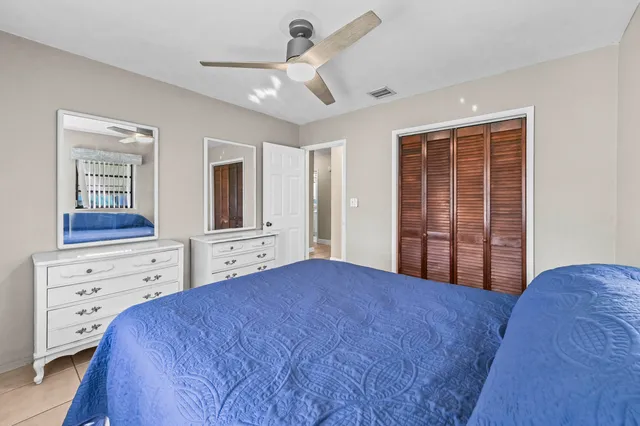 a bathroom with a toilet sink and shower