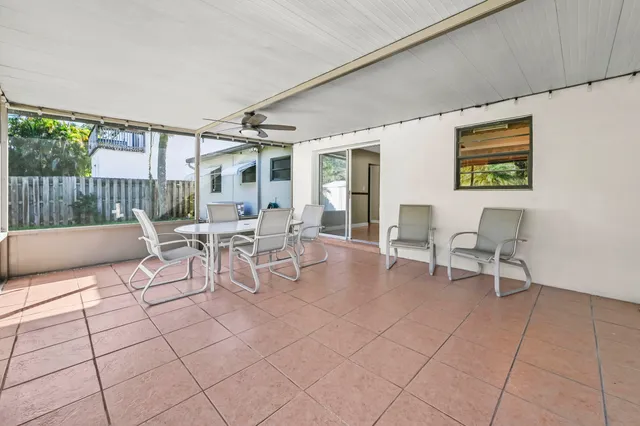 a view of a park with large trees