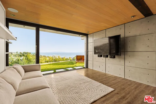 a view of a living room and a flat screen tv