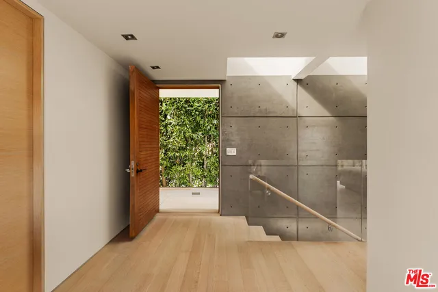 a view of hallway with natural light