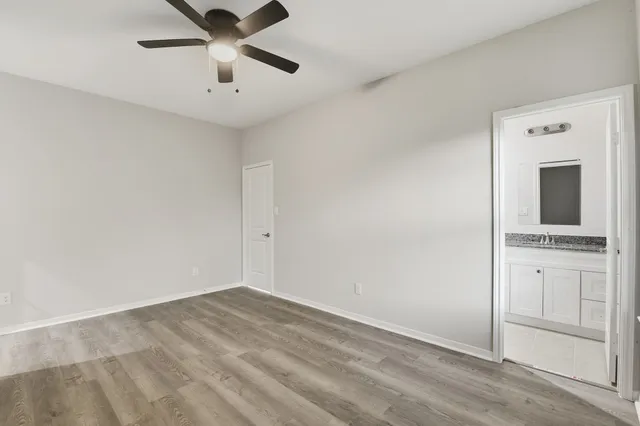 an empty room with a bathroom