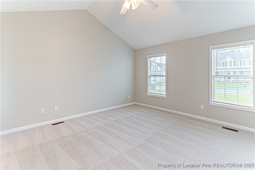 3831 Talus Road Fayetteville, NC 28306 - Photo 19 of 41 an empty room with windows and closet