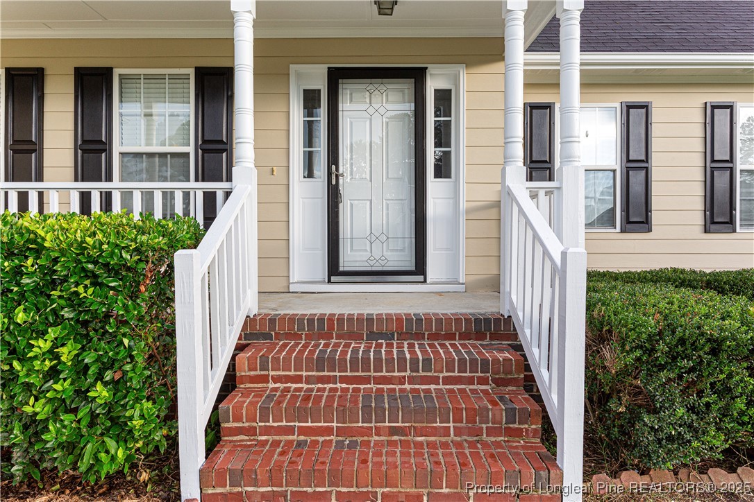 3831 Talus Road Fayetteville, NC 28306 - Photo 2 of 41 front view of a house with a rug