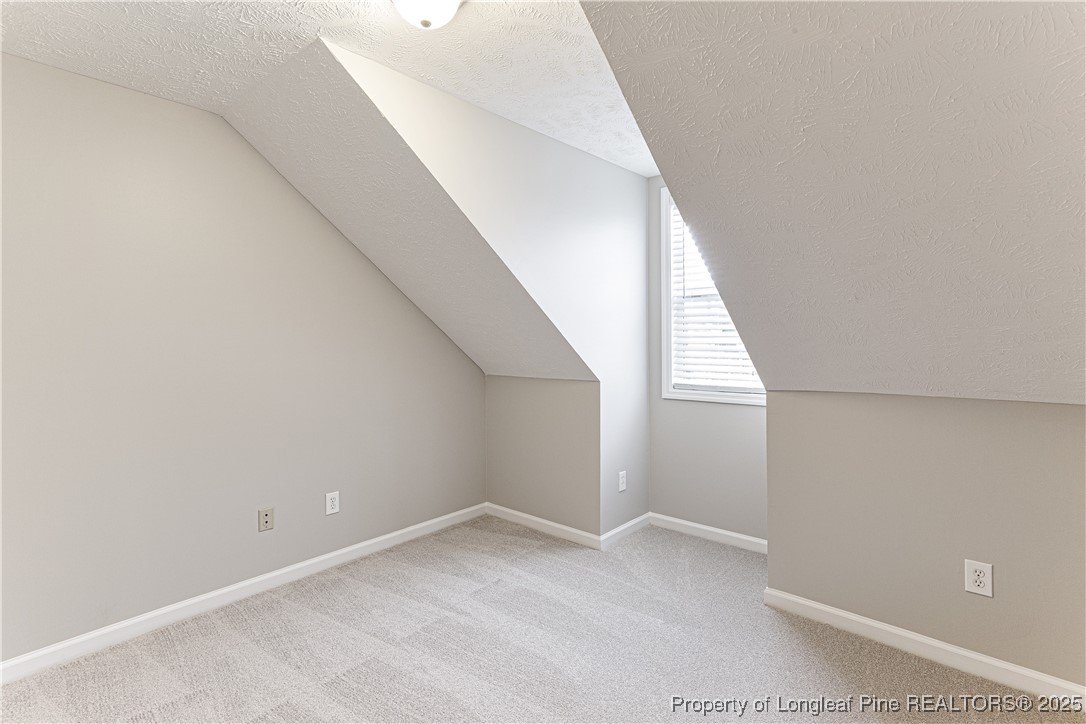 3831 Talus Road Fayetteville, NC 28306 - Photo 26 of 41 a view of a big room with stairs