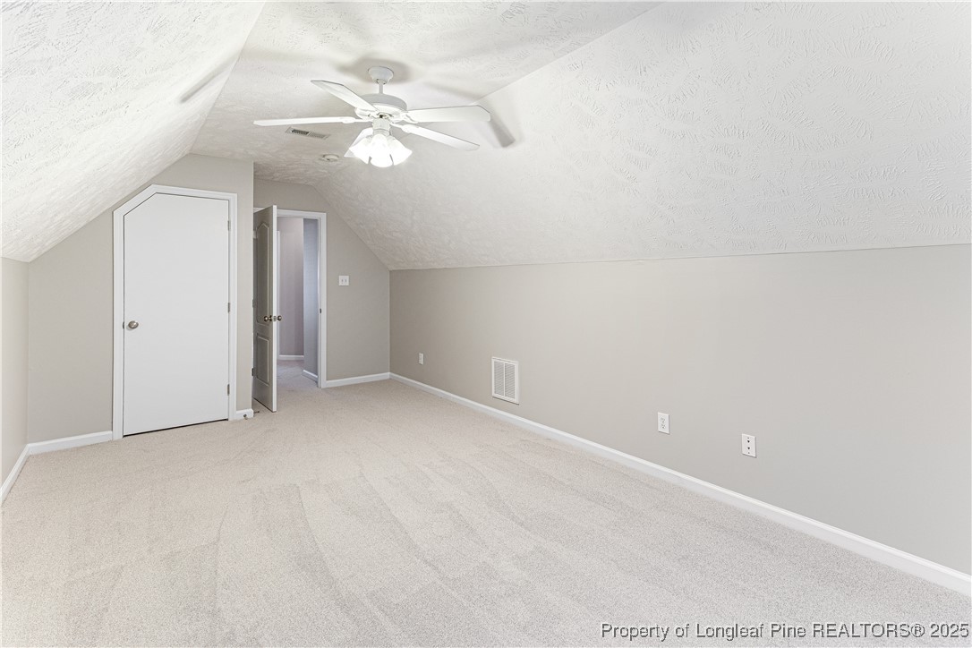 3831 Talus Road Fayetteville, NC 28306 - Photo 34 of 41 a view of a livingroom with a chandelier fan