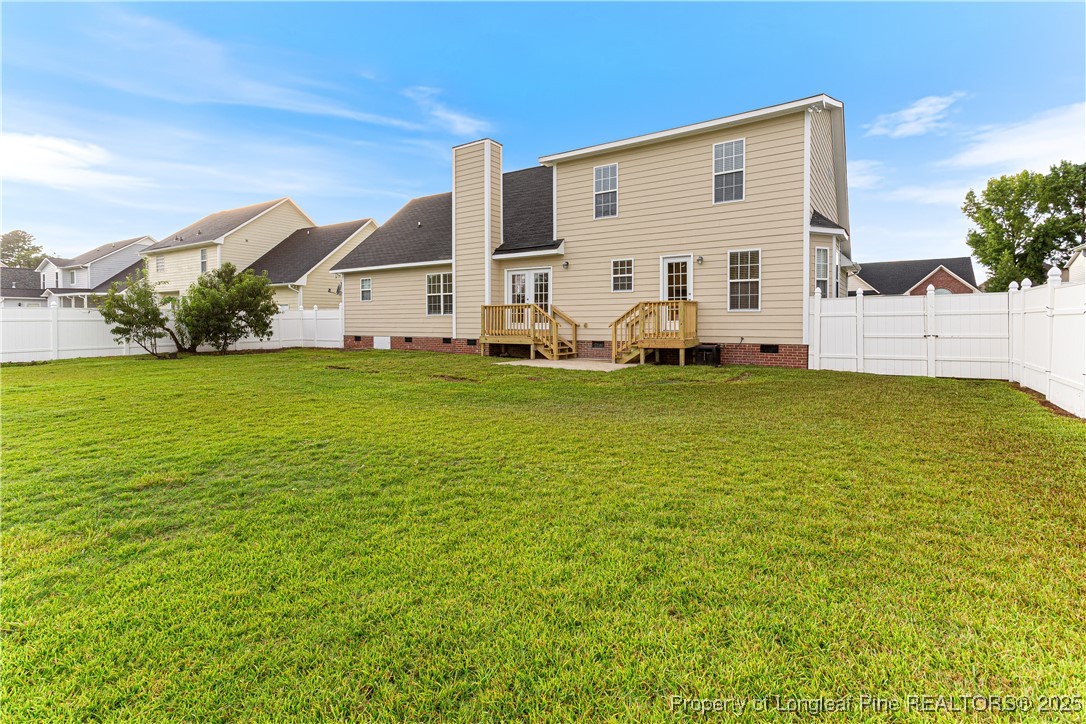 3831 Talus Road Fayetteville, NC 28306 - Photo 36 of 41 a view of a house with a yard