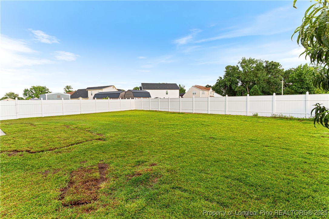 3831 Talus Road Fayetteville, NC 28306 - Photo 41 of 41 a view of a lake with houses