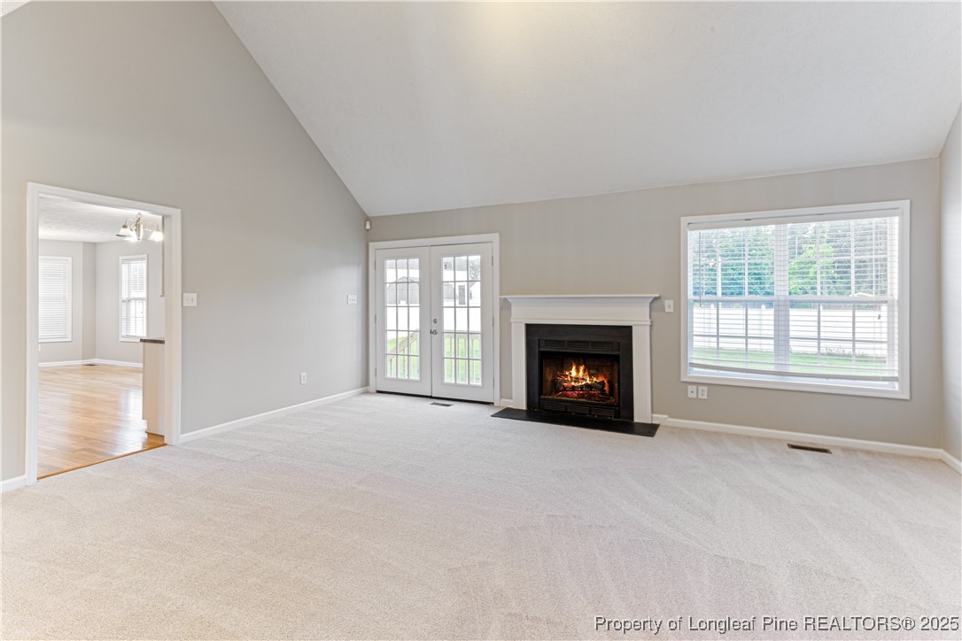 3831 Talus Road Fayetteville, NC 28306 - Photo 8 of 41 a view of an empty room with window and fire place