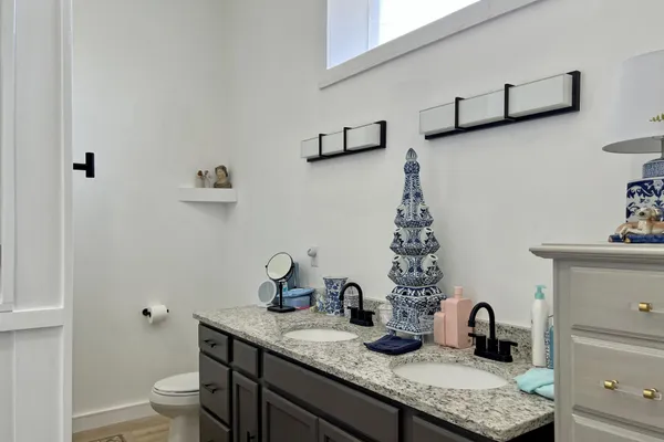 a kitchen with cabinets and a stove top oven
