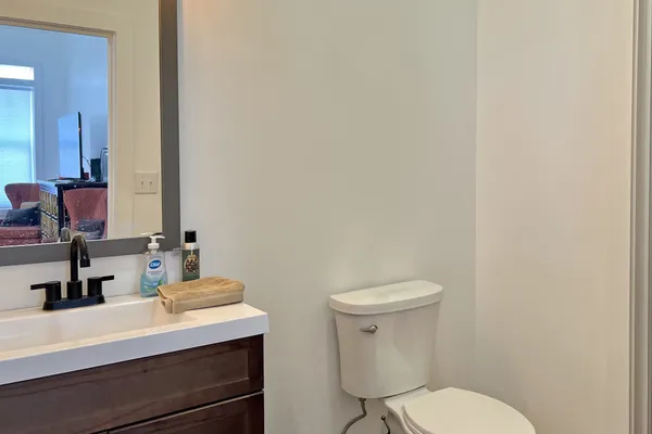 a view of a workspace with furniture