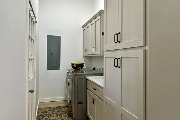 a bedroom with furniture and a bed
