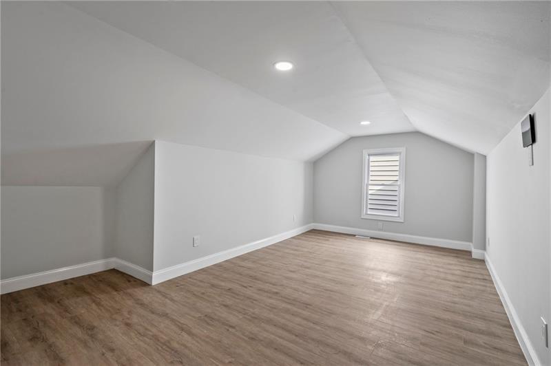 50 Southern Pittsburgh, PA 15211 - Photo 37 of 45 an empty room with wooden floor and windows