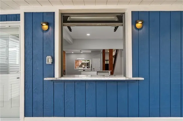 a bathroom with a sink and mirror