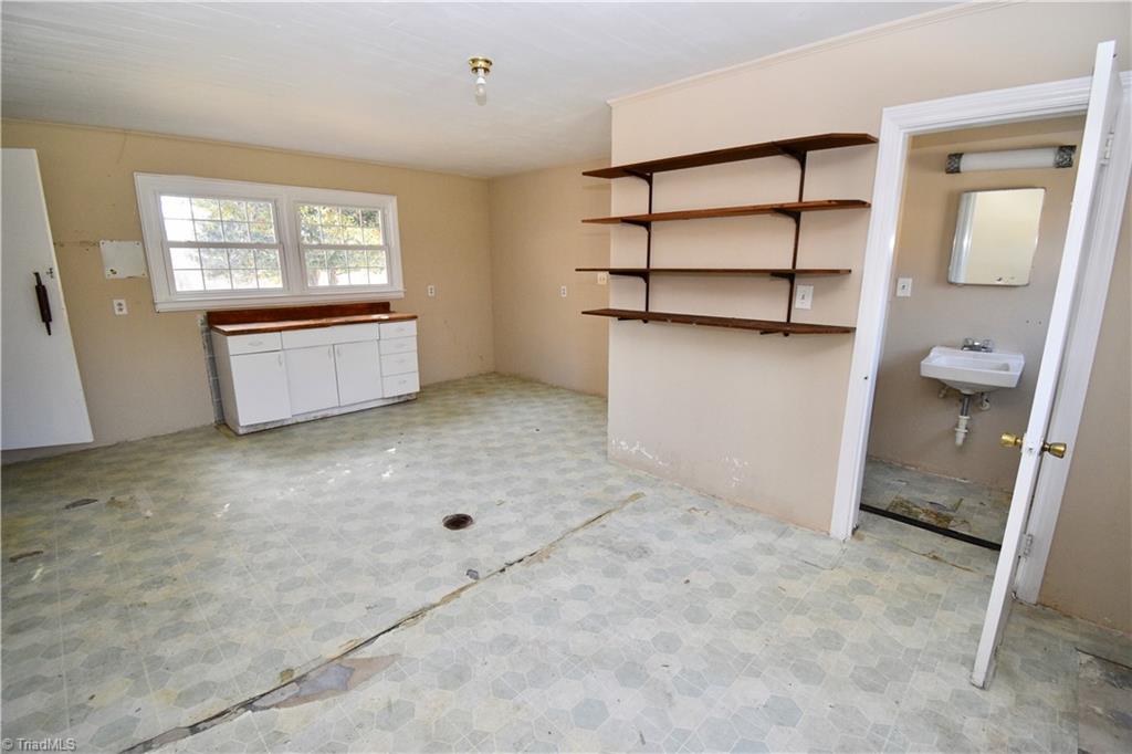 6328 Monnett Road Climax, NC 27233 - Photo 36 of 47 Living space and 2 bathrooms off kitchen